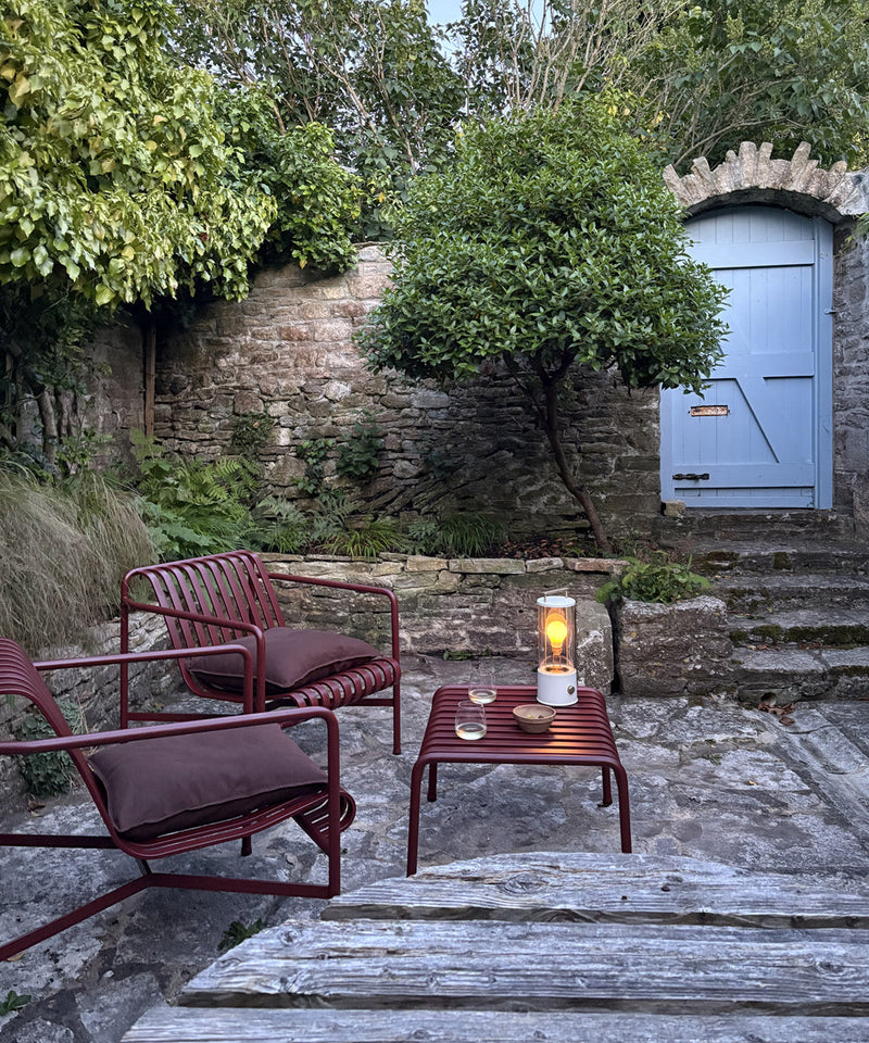 Featuring two Palissade lounge chairs and an ottoman