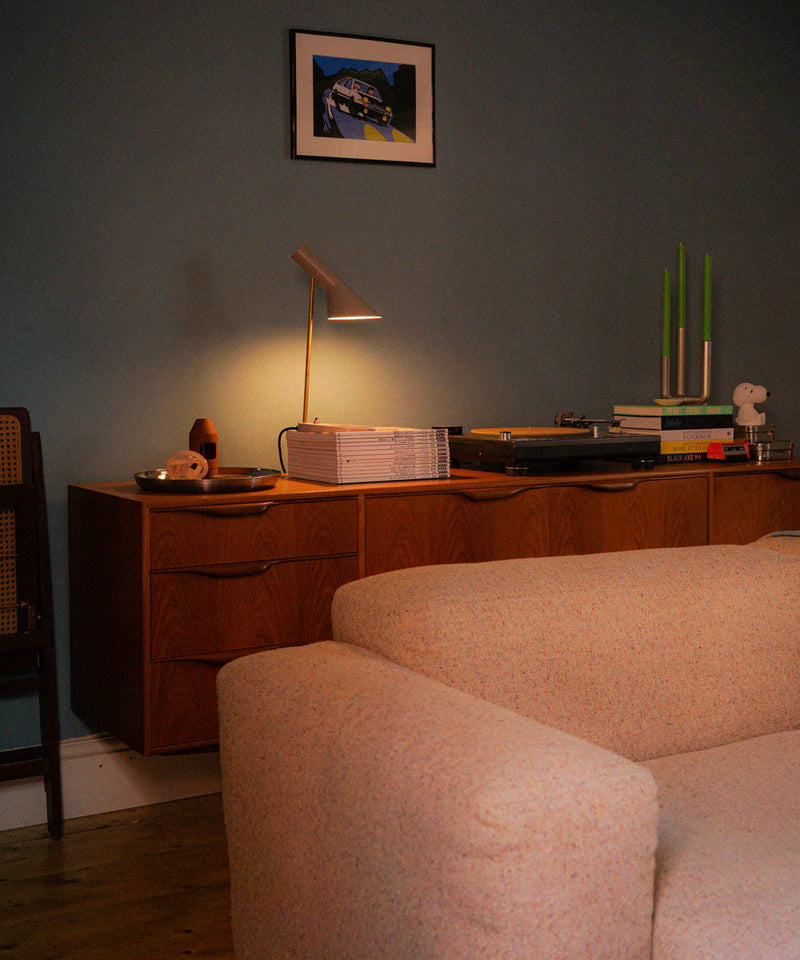 Modern paired back living room featuring a sideboard with the AJ Table Lamp Mini