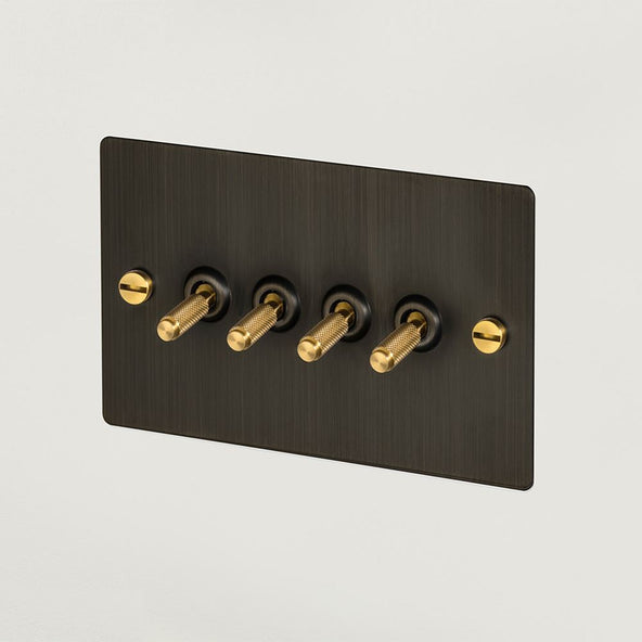 Outlet Buster + Punch 4G Toggle Switch - Smoked Bronze / Brass
