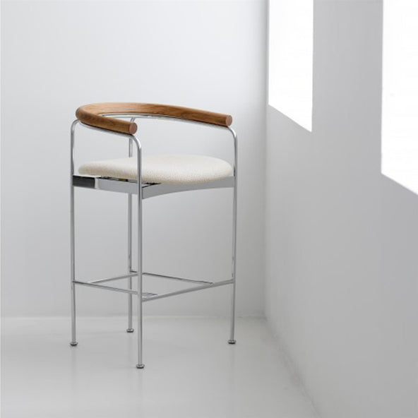 Counter stool with light seat in a modern room setting.